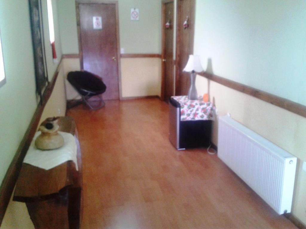 Hostal El Rincón Puerto Natales Habitación foto