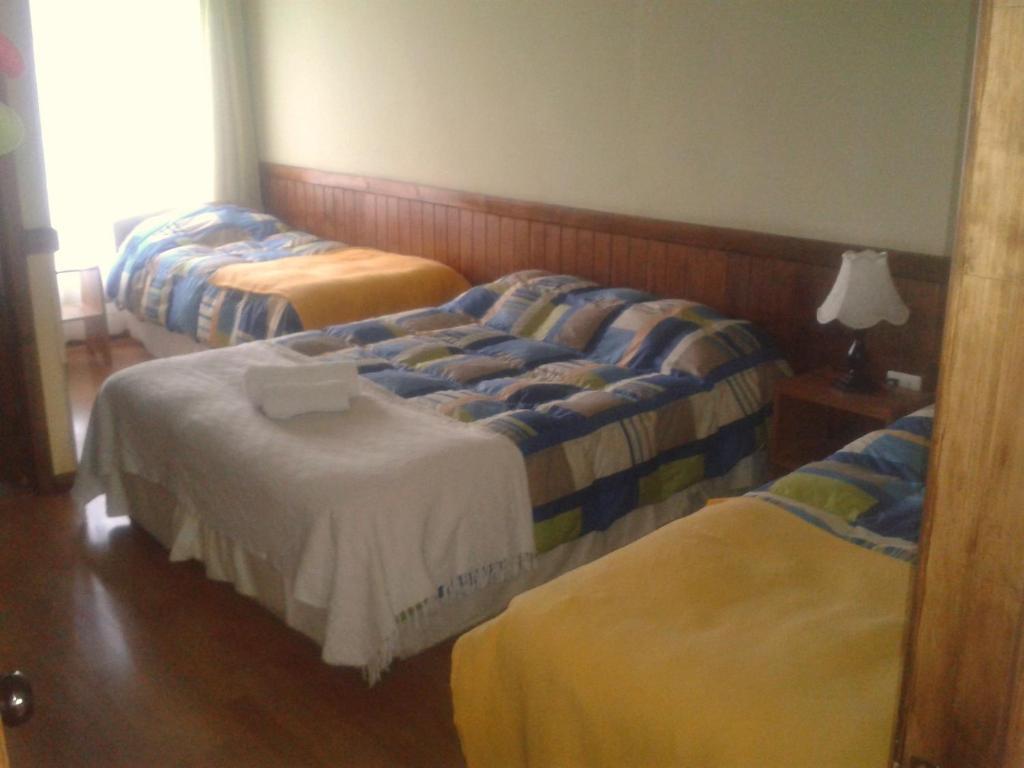Hostal El Rincón Puerto Natales Habitación foto